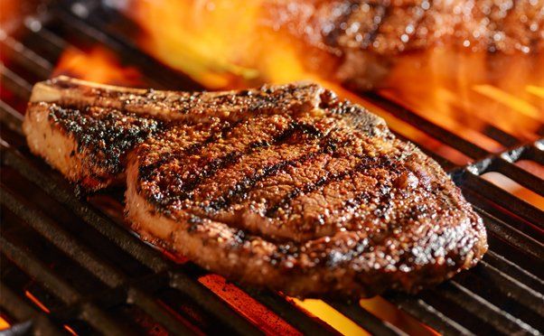 Steak with crosshatch grill marks on a gas grill