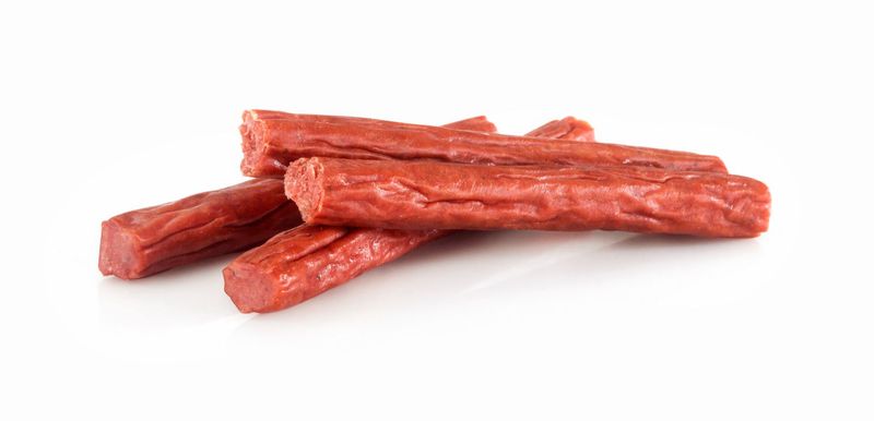 Seven pepper snack stix on a white background